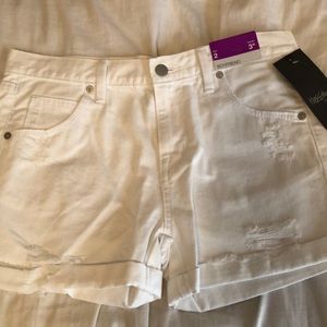 Distressed white shorts